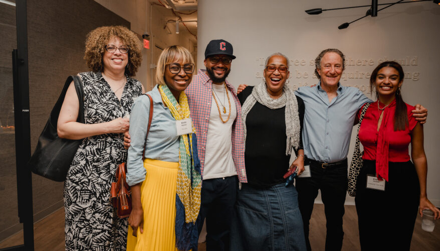 A group of people pose for a photo