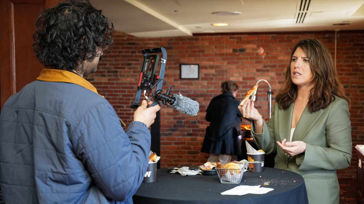 Baltimore Banner Audience Engagement Editor Krishna Sharma films a TikTok.