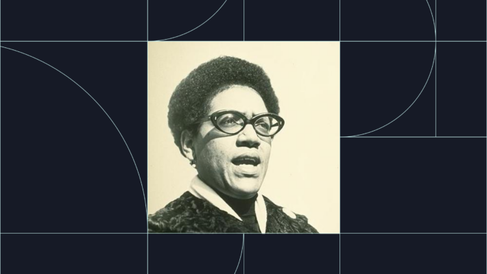 A portrait of Audre Lorde on a navy blue background
